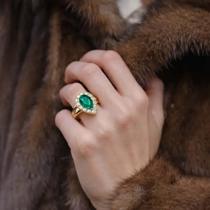 Coloured gemstone wedding ring on model