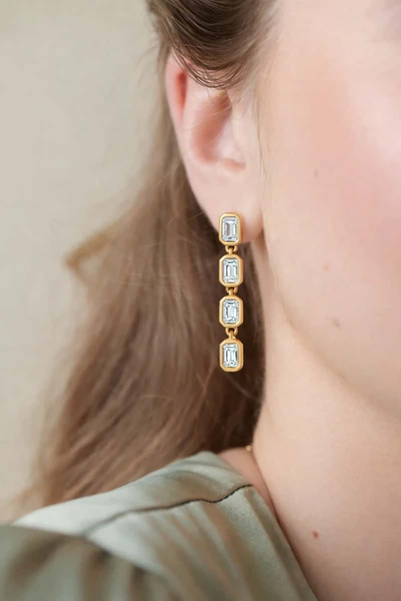 Lab-grown diamond earrings on model
